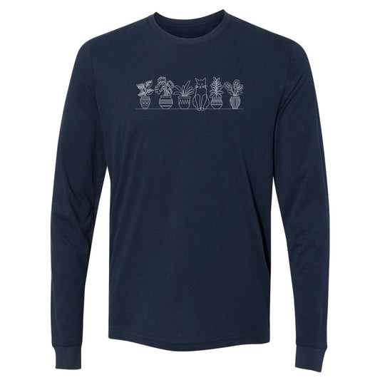 A dark blue, cute, long-sleeve potted plant shirt for gardeners that has a row of potted plants sitting on shelf, with a cat sitting in the middle.