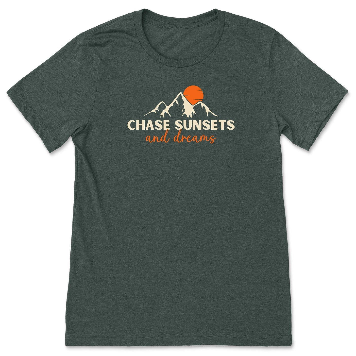A forest green, chasing sunsets t-shirt that has mountains with an orange sunset and says, "Chase Sunsets and Dreams."