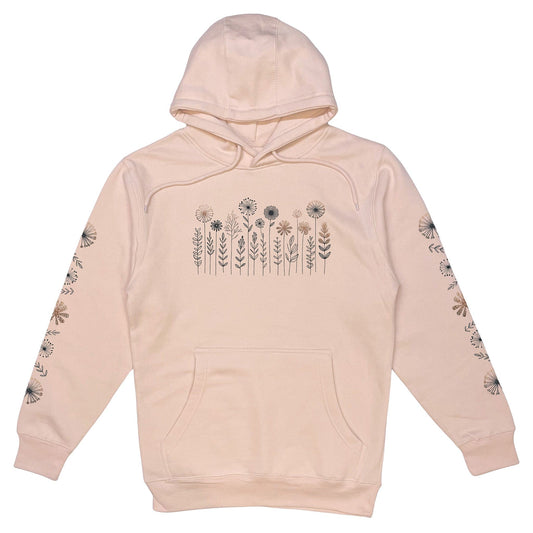 A beautiful light pink, floral print hoodie that has cute wildflowers on the front and down the sleeves.