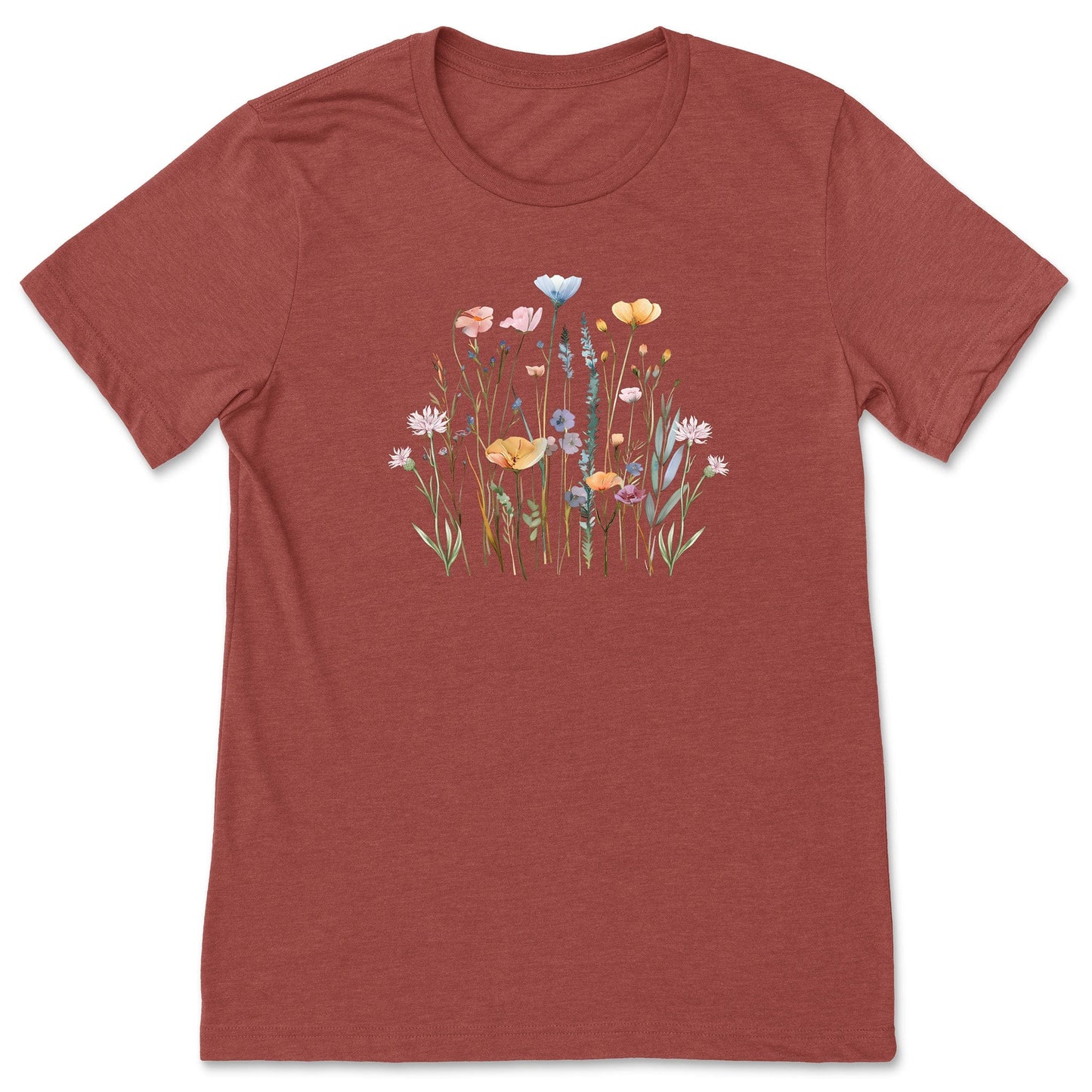 A pretty, clay-colored, soft, wildflower shirt for women and gardeners that has a print with pastel flowers on it.