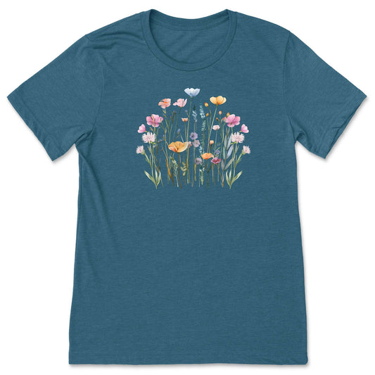 A pretty, teal, soft, wildflower shirt for women and gardeners that has a print with pastel flowers on it.