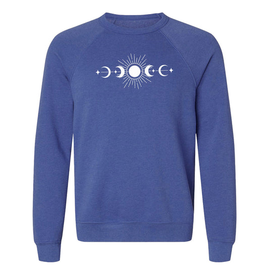 A blue raglan sweatshirt with a sun, star, and moon phases design on the front.