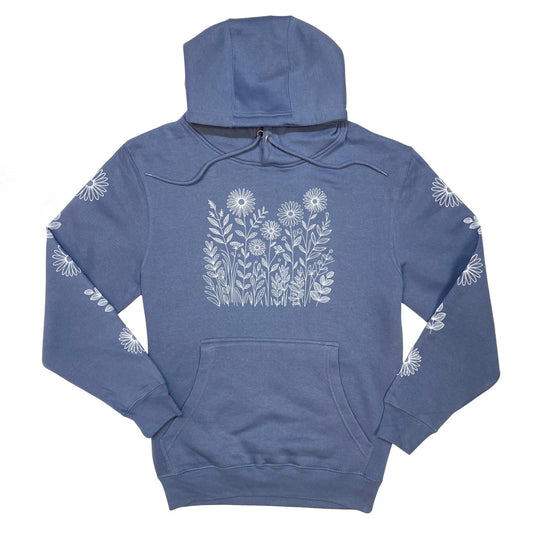 A pretty, periwinkle blue hoodie with white floral patterns on the front and sleeves, laying on a white background