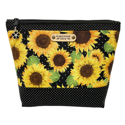 Cosmetic bag with sunflower pattern and 'Oakstone Five' branding on a white background