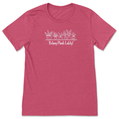 A raspberry pink, short-sleeve, funny plant t-shirt for gardeners and botanists that has a design with potted plants and says, "Botany Plants Lately?"