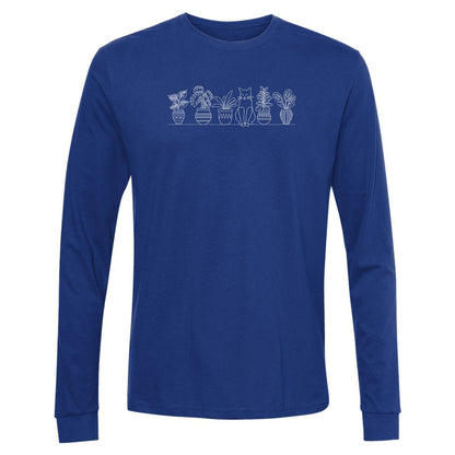 A royal blue, cute, long-sleeve plant t-shirt for gardeners that has a row of potted plants sitting on shelf, with a cat sitting in the middle.