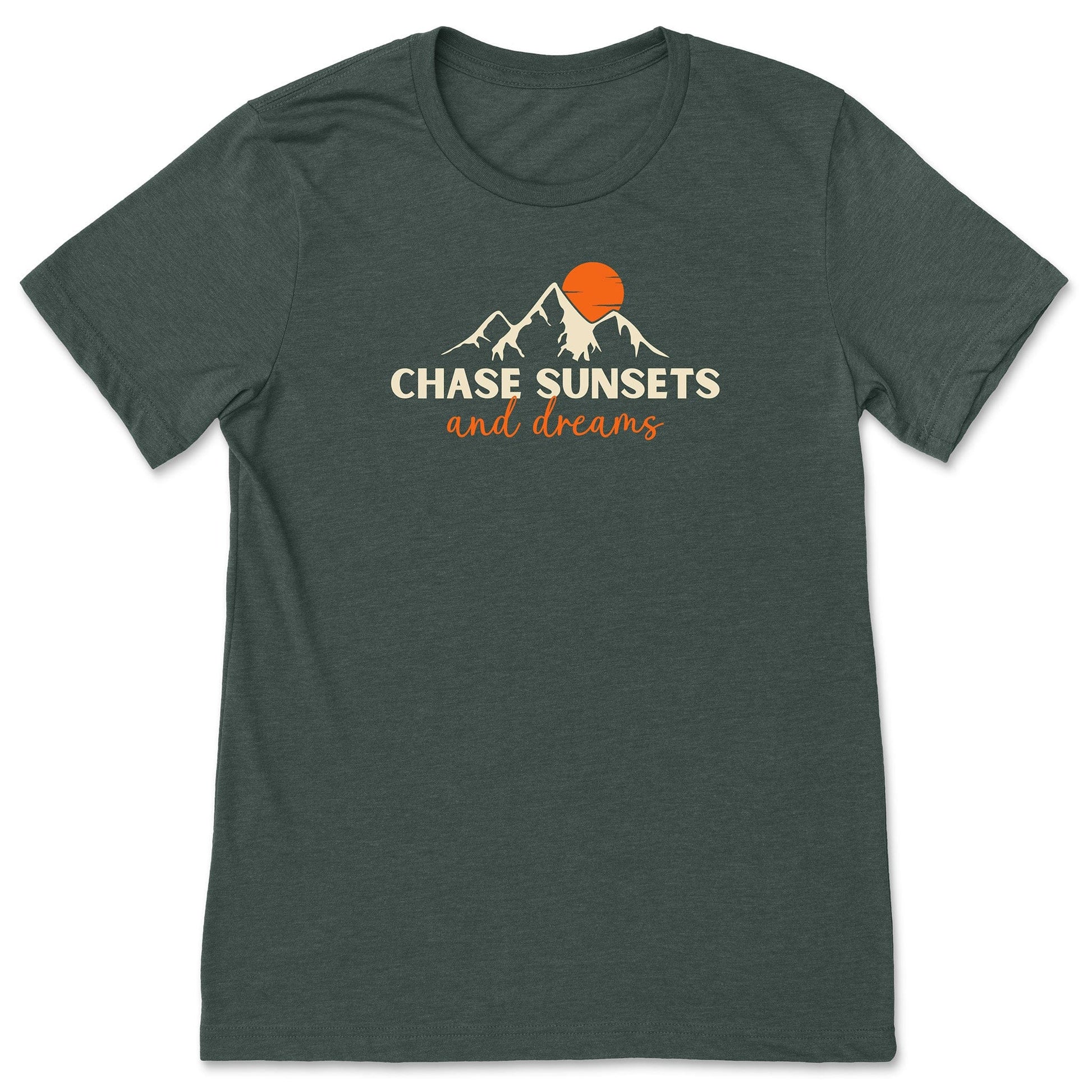 A forest green, chasing sunsets t-shirt that has mountains with an orange sunset and says, "Chase Sunsets and Dreams."