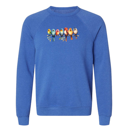 A cute bird sweatshirt for nature lovers that has a row of colorful birds sitting on a tree branch.