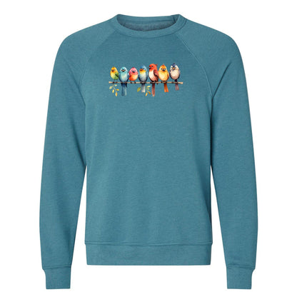 A cute bird sweatshirt for nature lovers that has a row of colorful birds sitting on a tree branch.