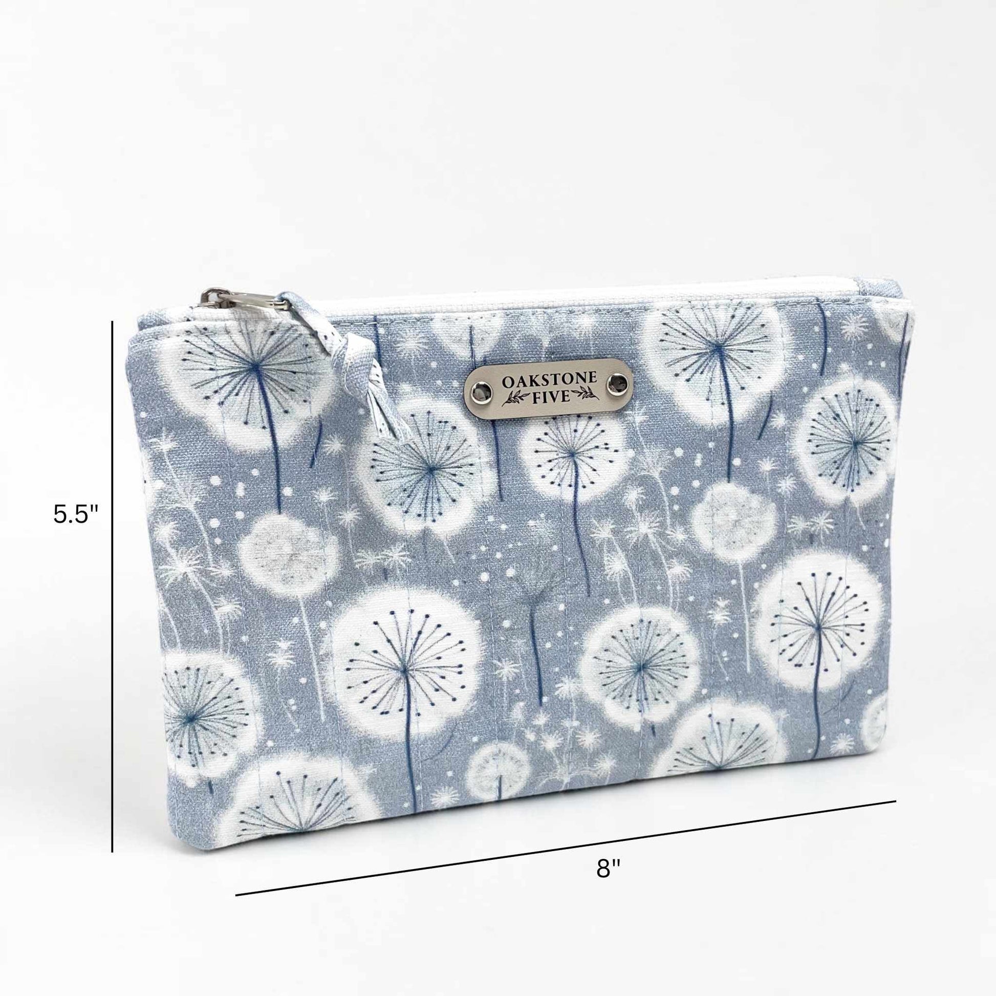Measurements for a zipper pouch with dandelion pattern and 'Oakstone Five' branding on a white background