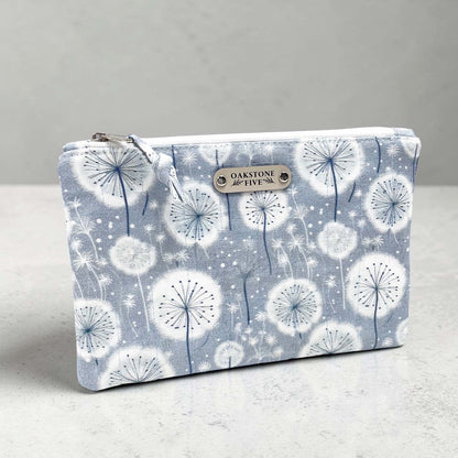 Zipper Pouch with dandelion pattern on a gray background