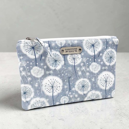 Zipper Pouch with dandelion pattern on a gray background