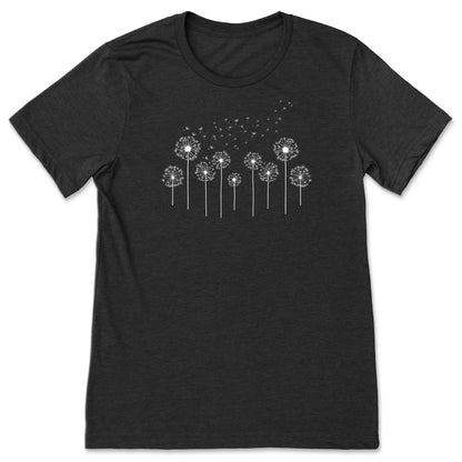 Black t-shirt with white dandelion graphic on a white background