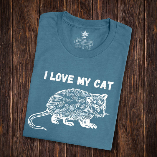 A teal, funny opossum shirt for animal lovers that says, "I love my cat".