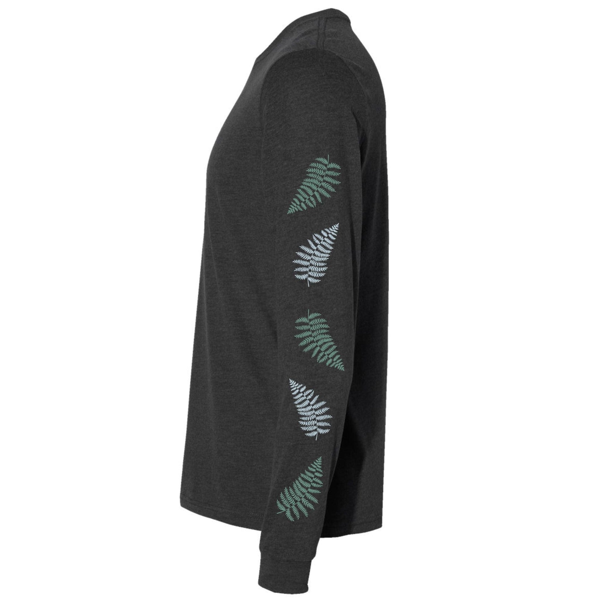The side view of a gray, long-sleeve t-shirt for hikers and nature lovers that has fern leaves going down both of the sleeves.