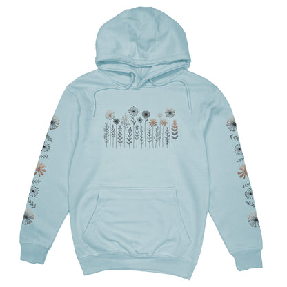 A beautiful light blue, floral print hoodie that has cute wildflowers on the front and down the sleeves.