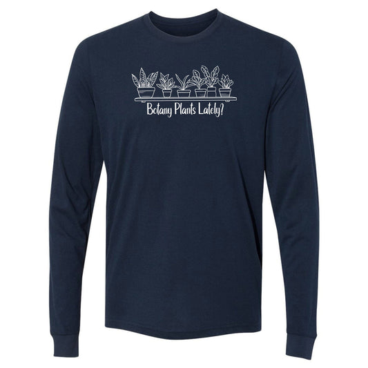 A navy, long-sleeve, funny botany shirt for plant lovers that has a design with a row of potted plants on a shelf and says, "Botany Plants Lately?"