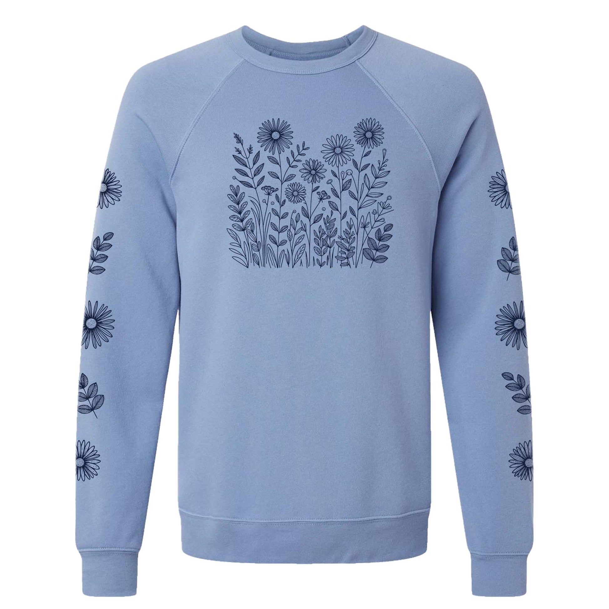 Light purple sweatshirt with floral pattern on the front and sleeves, on a white background