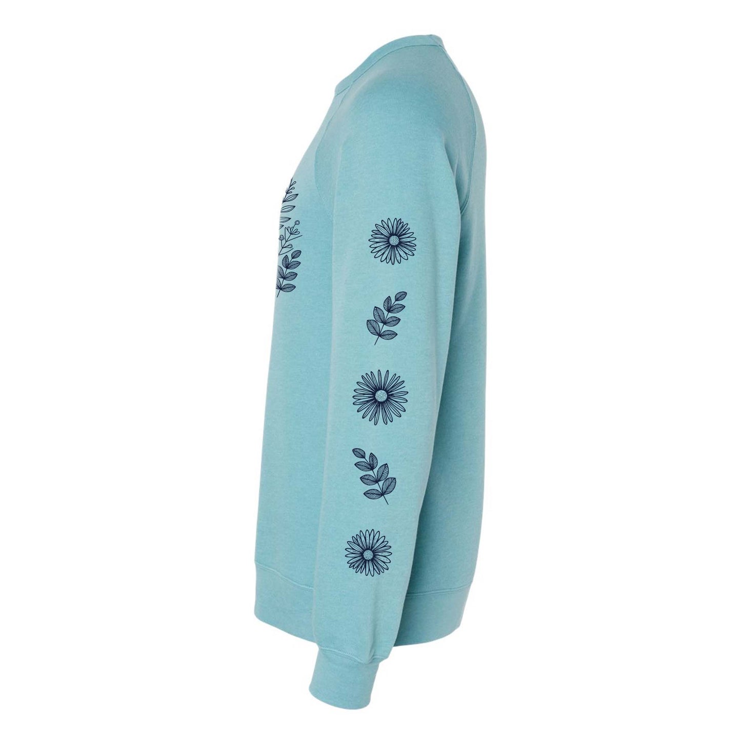 Side view of light blue sweatshirt with floral pattern on the front and sleeves, on a white background