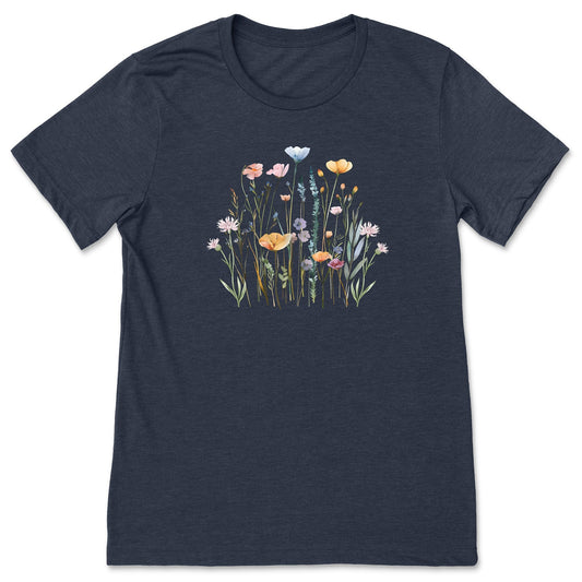 A pretty, navy, soft, wildflower shirt for women and gardeners that has a print with pastel flowers on it. 