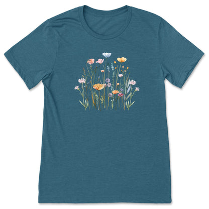 A pretty, teal, soft, wildflower shirt for women and gardeners that has a print with pastel flowers on it. 