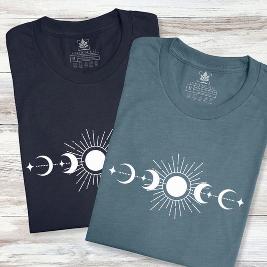 Folded celestial sun and moon phases t-shirts for nature lovers.