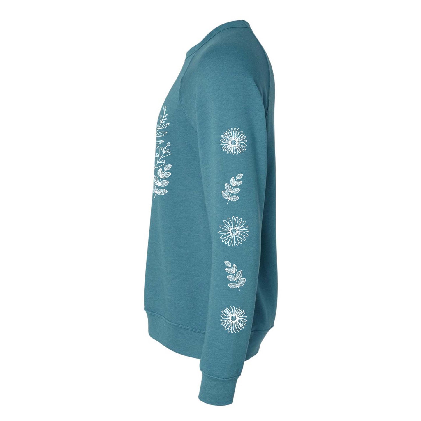 Side view of a teal sweatshirt with white floral patterns on the front and on both sleeves, on a white background