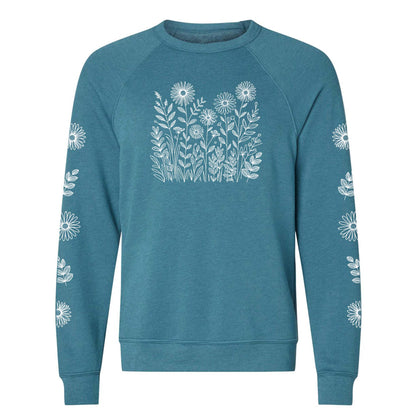 Teal sweatshirt with white floral patterns on the front and on both sleeves, on a white background