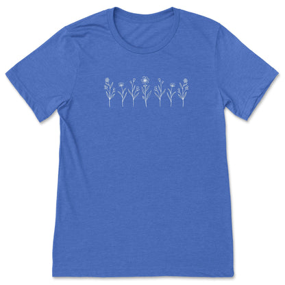 A cute, royal blue, wildflower t-shirt that has white flowers on it - great for nature and flower lovers! 