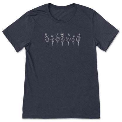 A cute, navy blue, wildflower t-shirt that has white flowers on it - great for nature and flower lovers! 