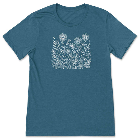 Teal t-shirt with white floral design on a white background